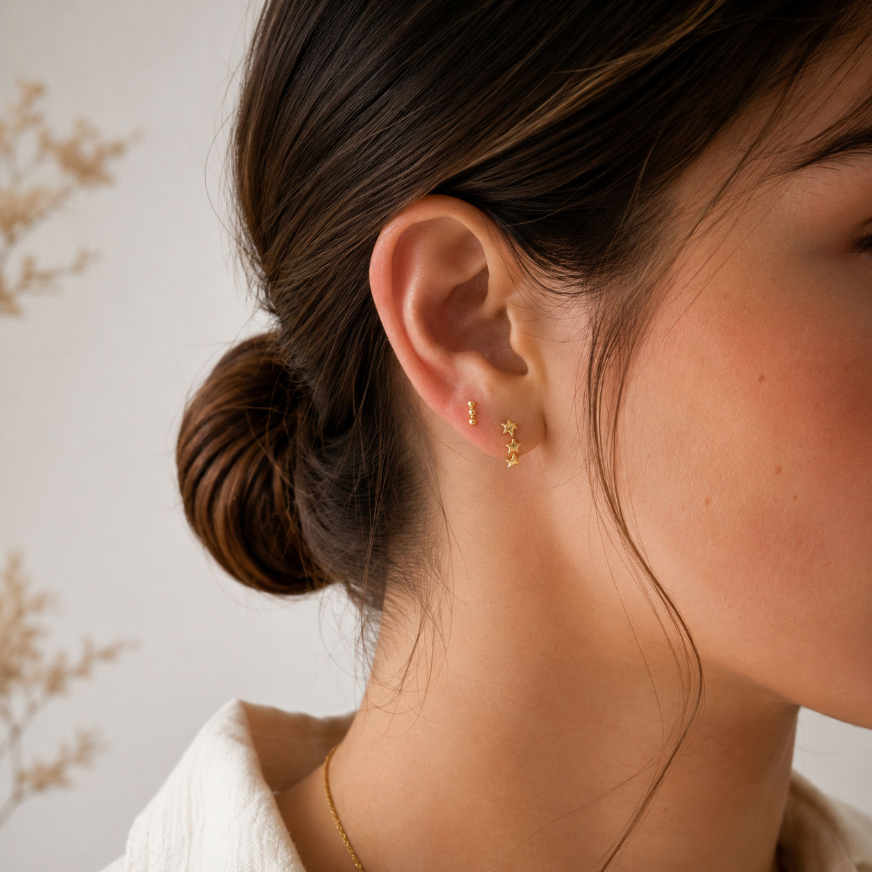14K Triple Star Curve Bar earring
