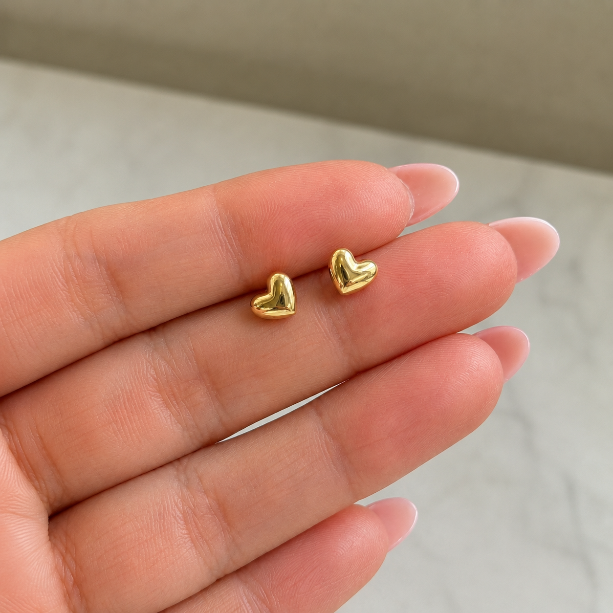 14K Puffy Heart Stud.