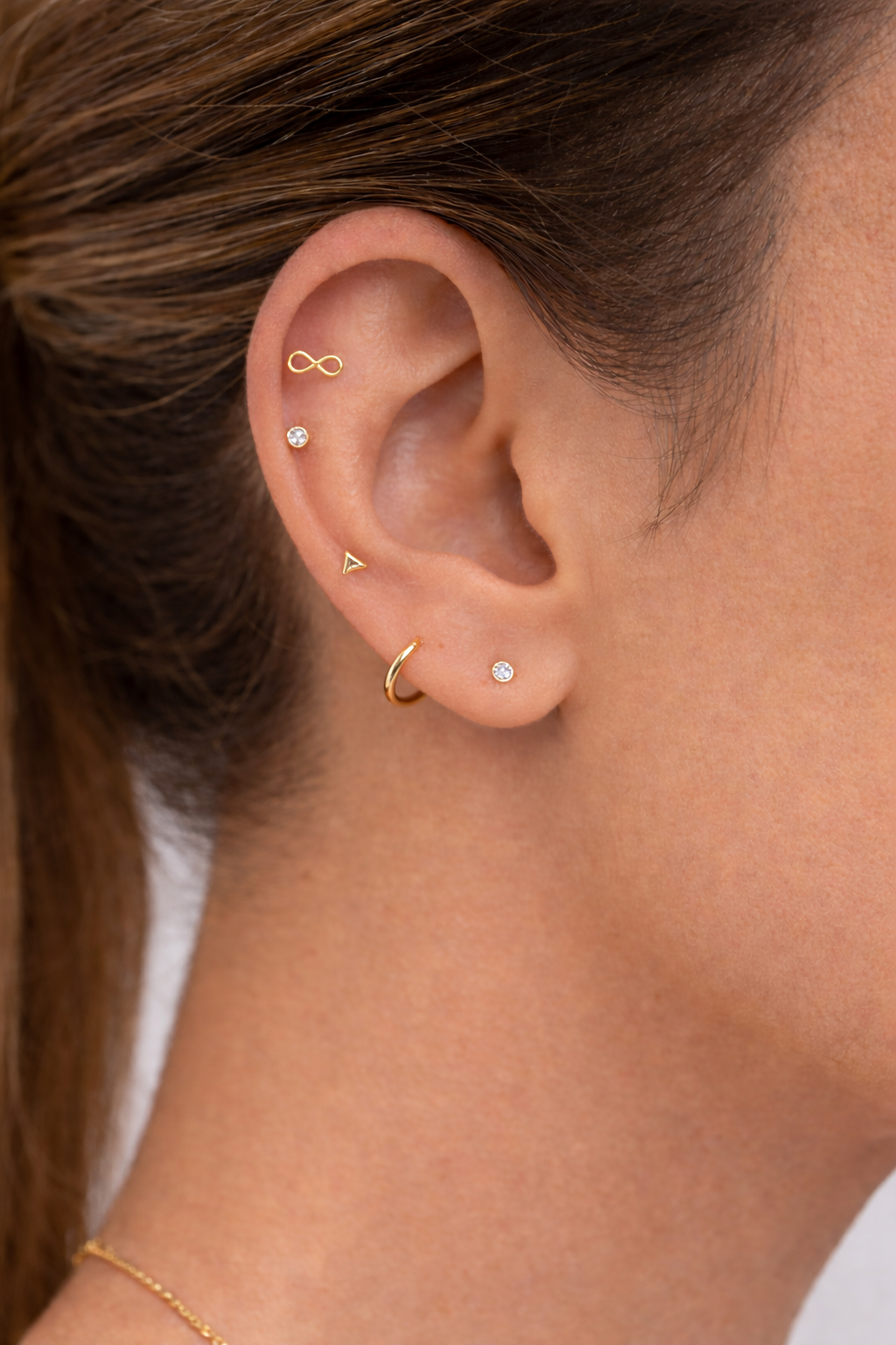 14Kt Tube Gold Infinitive stud